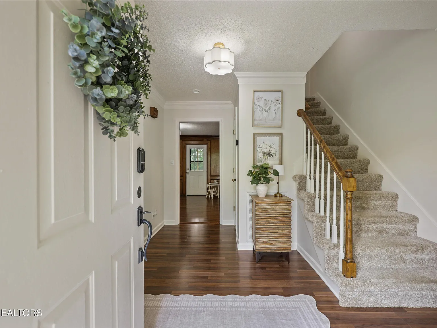 Bright foyer with hardwood floors at 11016 Calloway View Dr